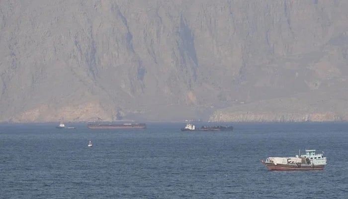 Ships and tankers in the Strait of Hormuz off the coast of Musandam, Oman, April 18, 2026. — Reuters