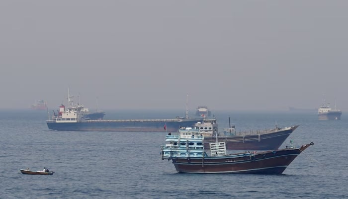 Ships and boats in the Strait of Hormuz off the coast of Musandam, Oman, April 20, 2026.—Reuters