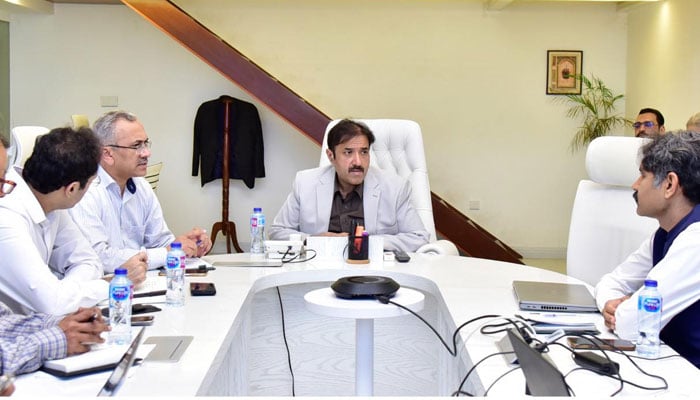 Punjab Minister for Local Government Zeeshan Rafique chairing a meeting on April 22, 2026. — Facebook@MianZeeshanRafiquePMLN
