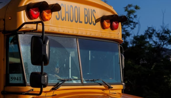 A school bus driver navigates while driving through downtown Los Angeles, California, U.S. July 19, 2023.—Reuters