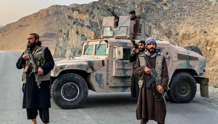 Taliban security personnel stand guard near the Torkham border crossing between Afghanistan and Pakistan in the Nangarhar province on February 27, 2026.— AFP