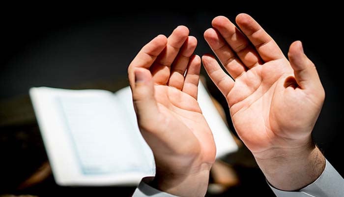 The representational image shows hands are raised in prayers. — The News/File