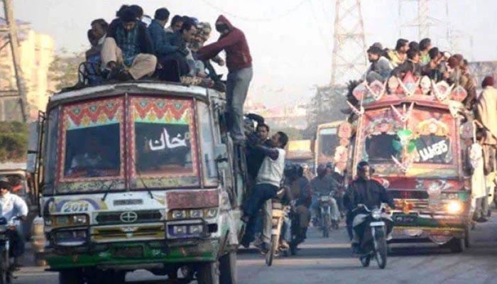 The representational image shows a view of local minibuses in Karachi. — Facebook@RanaSikandarHayat.Official/File