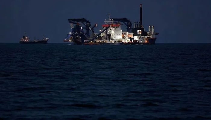 The Artemis dredger operated by Van Oord sits anchored as the traffic is down in the Strait of Hormuz, amid the US-Israeli conflict with Iran, in Muscat, Oman, March 10, 2026. — Reuters