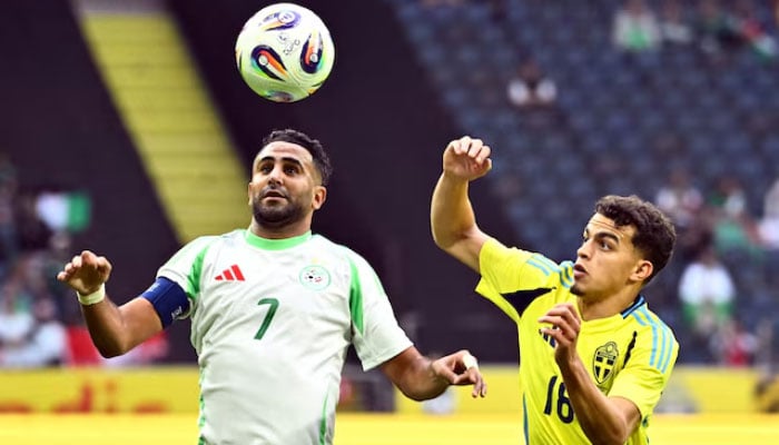 Algerias Riyad Mahrez in action with Swedens Yasin Ayari Christine Olsson in International Friendly on  June 10, 2025. — Reuters