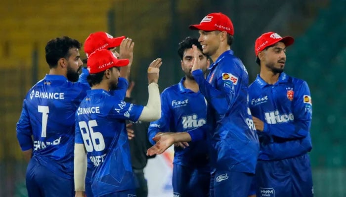 Islamabad Uniteds Shadab Khan (left) celebrates taking a wicket with teammates during their PSL 11 match against Hyderabad Kingsmen at the National Bank Stadium in Karachi on April 24, 2026. — PSL
