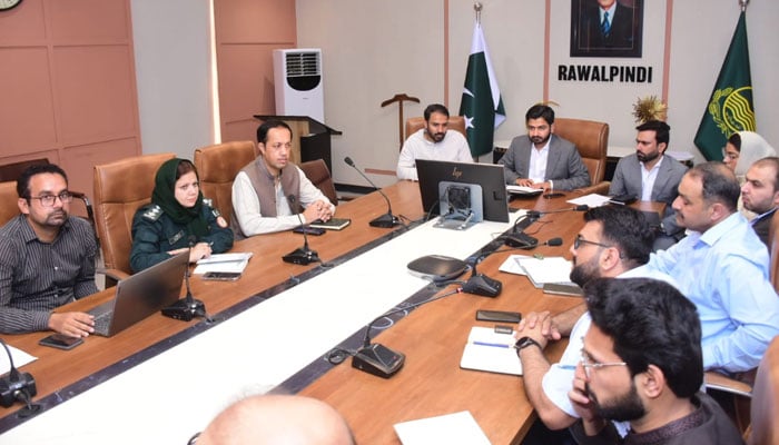 Deputy Commissioner Dr Hasan Waqar Cheema chairing a meeting of the District Emergency and Response Committee to control dengue, on April 24, 2026. — Facebook@dcorawalpindi