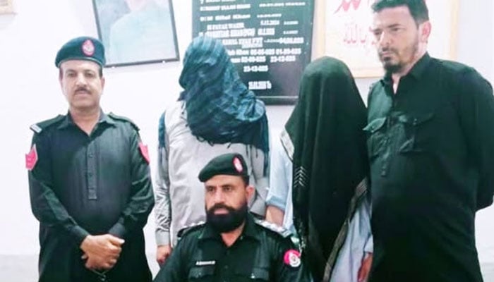 The image shows two persons in custody of the Bannu police on April 24, 2026. — Facebook@BannuPoliceKPK