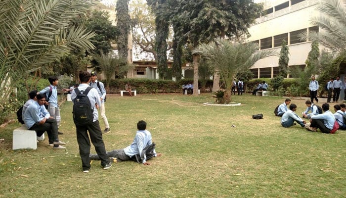 The image shows students at the premises of the Jamia Millia Government Degree College, Malir.  — Facebook@Jamia Millia Government Degree College Evening, Malir, Karachi