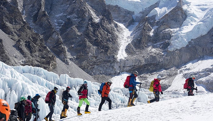 Members of an expedition team hike at Khumbu Icefall, as the route to Mount Everest Camp One has not yet been opened for the season in Solukhumbu district, also known as the Everest region, Nepal, April 22, 2026. — Reuters