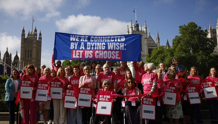 Pro-euthanasia campaigners seen outside parliament.— AFP/File