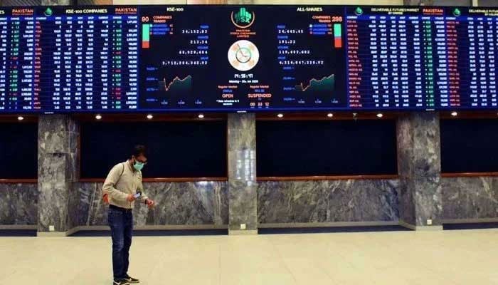 A trader can be seen at the Pakistan Stock Exchange (PSX) building in Karachi. —PPI/File