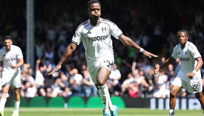 Ryan Sessegnon of Fulham (centre) celebrates after scoring in a Premier League match against Aston Villa in London. —Reuters