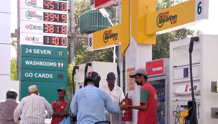 People get fuel at a petrol station, in Karachi on April 25, 2026. — Online