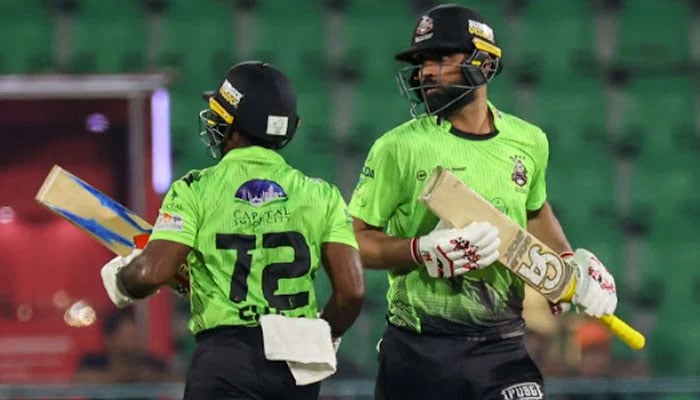 Lahore Qalandars Fakhar Zaman (right) and Charith Asalanka running between the wickets during the PSL 11 match against Peshawar Zalmi at Gaddafi Stadium in Lahore on April 25, 2026. — PSL