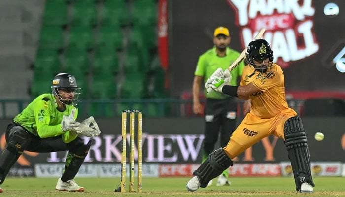 Peshawar Zalmis Babar Azam plays a shot during their PSL 11 match against Lahore Qalandars at the Gaddafi Stadium in Lahore on April 25, 2026. — PSL