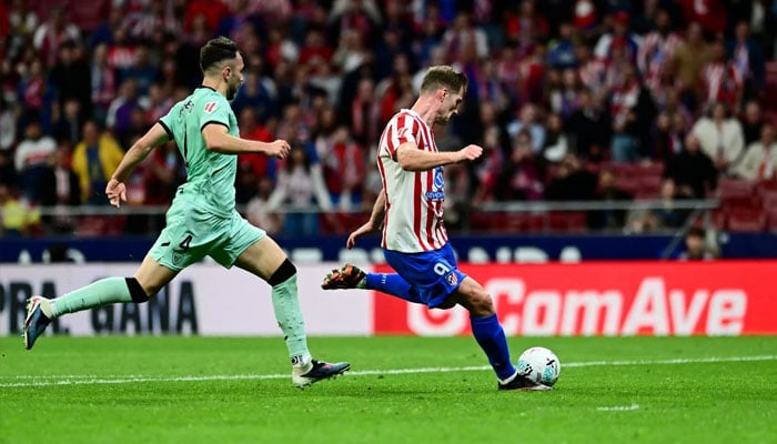 Atletico Madrids Alexander Sorloth scores their third goal. —Reuters