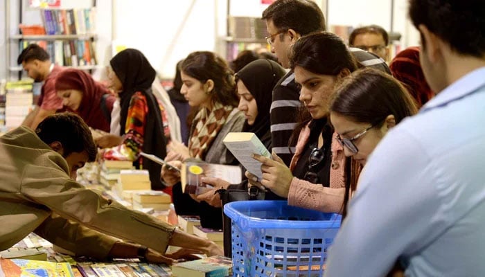 Visitors take keen interest in books during the Karachi World Book Fair, organised by the Publishers and Book Sellers Association (PPBA) at Expo Centre in Karachi on December 18, 2025. — PPI