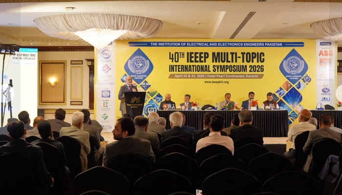 A speaker is addressing the 40th IEEP Multi-Topic International symposium 2026. — Facebook/IEEEP