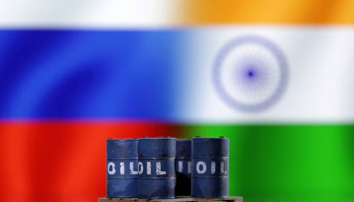 A model of oil barrels is seen in front of Russian and Indian flags in this illustration taken, December 9, 2022. — Reuters