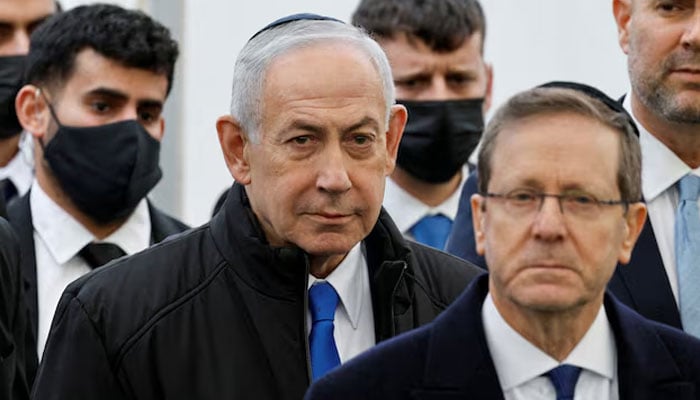 Israeli Prime Minister Benjamin Netanyahu and Israeli President Isaac Herzog attend a memorial service in Meitar, Israel, January 28, 2026. — Reuters