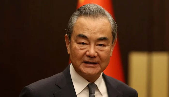 Chinese Foreign Minister Wang Yi gestures during an event in Ankara, Türkiye, on July 26, 2023. — Reuters