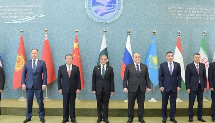 Participants pose for a group photo at the Jinnah Convention Centre for the SCO summit in Islamabad on October 16, 2024. — PID