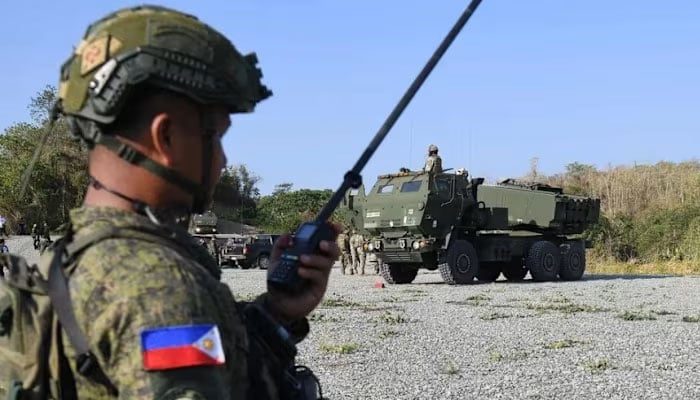 A Philippine soldier speaks on a walkie-talkie in this representative image. — AFP/File