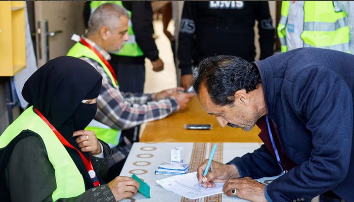 A Palestinian man votes during the municipal election at a polling station in Deir al-Balah, central Gaza Strip April 25, 2026. — Reuters