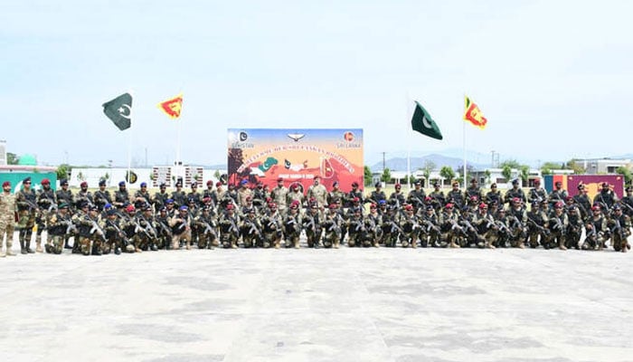Pakistani and Sri Lankan military officials pose for a group photo at the beginning of two-week exercises in Tarbela, Pakistan, on April 27, 2026. —ISPR
