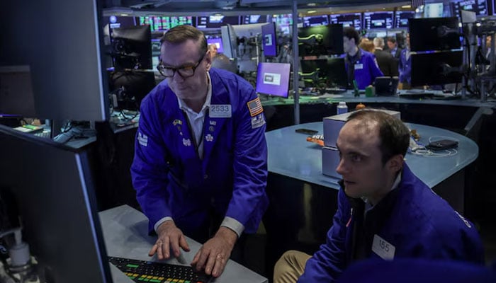 Traders work on the floor at the New York Stock Exchange (NYSE) in New York City, U.S., April 16, 2026.—Reuters