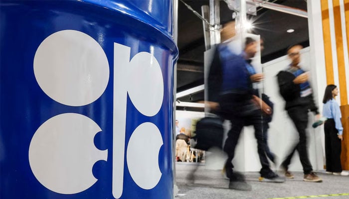 People walk past an installation depicting barrel of oil with the logo of Organization of the Petroleum Exporting Countries (OPEC) during the COP29 United Nations climate change conference in Baku, Azerbaijan November 19, 2024.—Reuters