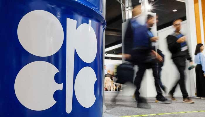People walk past an installation depicting barrel of oil with the logo of Organisation of the Petroleum Exporting Countries (Opec) during the COP29 United Nations climate change conference in Baku, Azerbaijan. — Reuters/File
