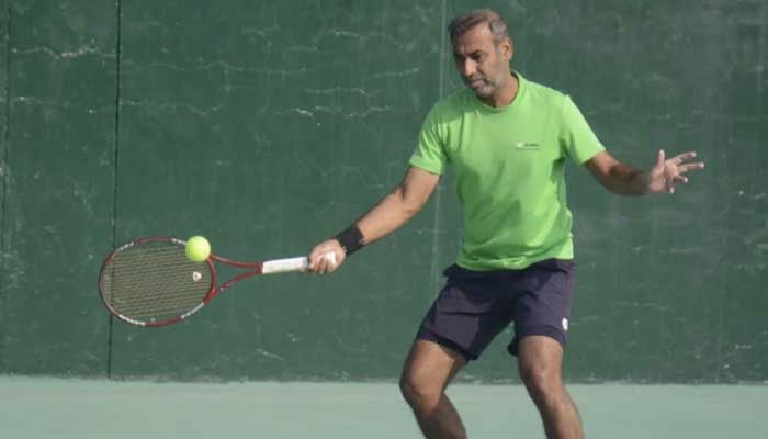 Aqeel Khan in action during 11th Begum Kulsum Saifullah Khan National Ranking Tennis Championships 2025 at PTF Tennis Complex. — Instagram/@pakistantennisfederation