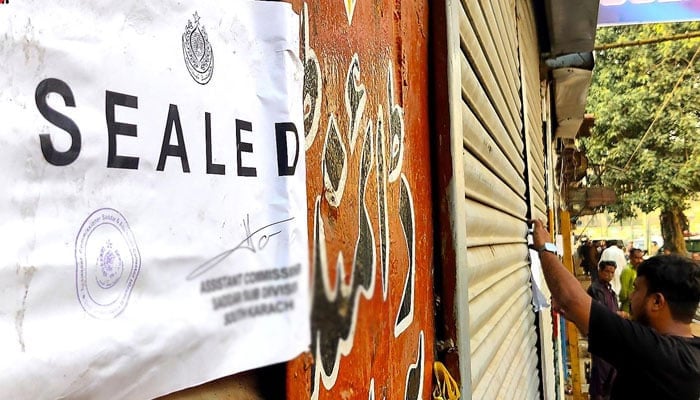 A view of closed sealed shops due to the violation of SoP in Karachi on January 6, 2026. — INP