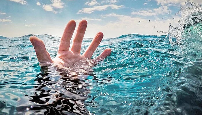 The representational image shows a hand emerging from water. — The News/File