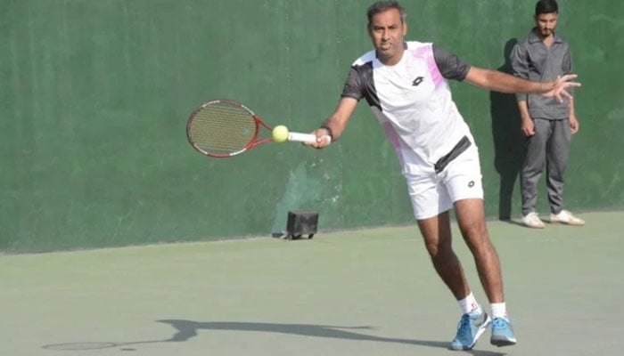 Muhammad Sohaib playing shot against Mudassir Murtaza. —APP/File
