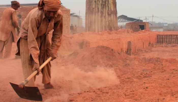 The representational image shows brick kiln workers. — The News/File