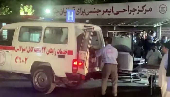 A screen grab shows an emergency vehicle as people arrive at a hospital after an attack at Kabul airport, in Kabul, Afghanistan August 26, 2021.—Reuters