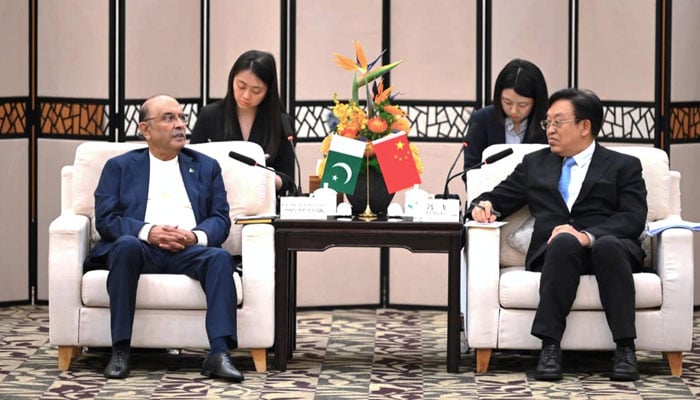 President Asif Ali Zardari is in a meeting with Feng Fei, party secretary of Hainan in Sanya, China, on April 30, 2026. — PID