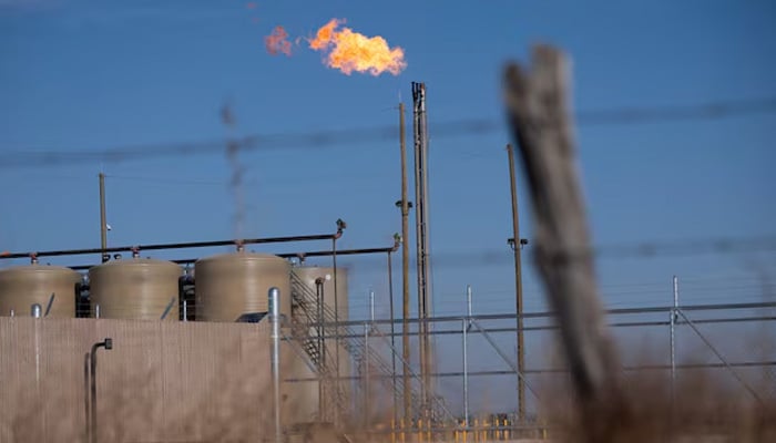A flare burns off excess natural gas in the Permian Basin oil field near Odessa, Texas, US February 18, 2025. — Reuters