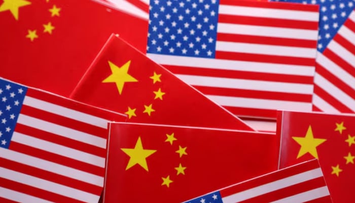 US and Chinese flags are seen in this illustration created on March 20, 2025. — Reuters