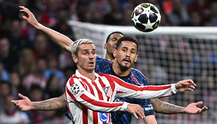 Arsenals Brazilian defender #06 Gabriel Magalhaes challenges Atletico Madrids French forward #07 Antoine Griezmann during the UEFA Champions League semi-final first leg football match between Club Atletico de Madrid and Arsenal at the Metropolitano stadium in Madrid on April 29, 2026. — AFP