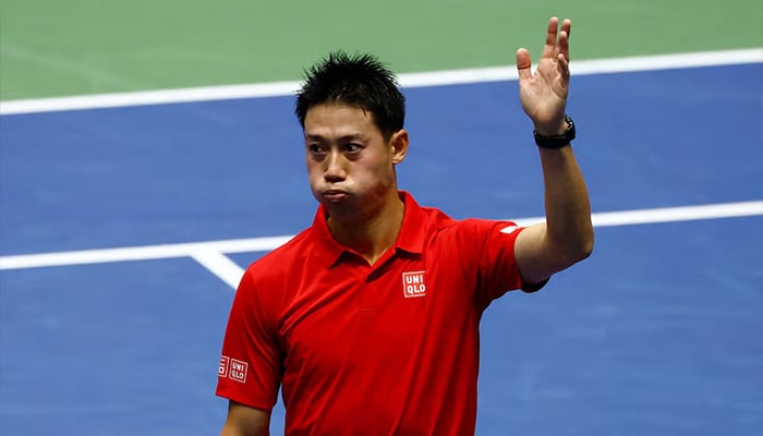 Japans Kei Nishikori waves towards spectators after winning his match against Britains Billy Harris. — Reuters/File