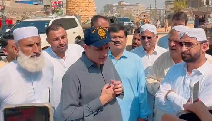 Karachi Mayor Murtaza Wahab talking to local people after inaugurating the Habib Bank Pump House  on May 1, 2026. — Facebook@barristermurtazawahabofficial/Screengrab