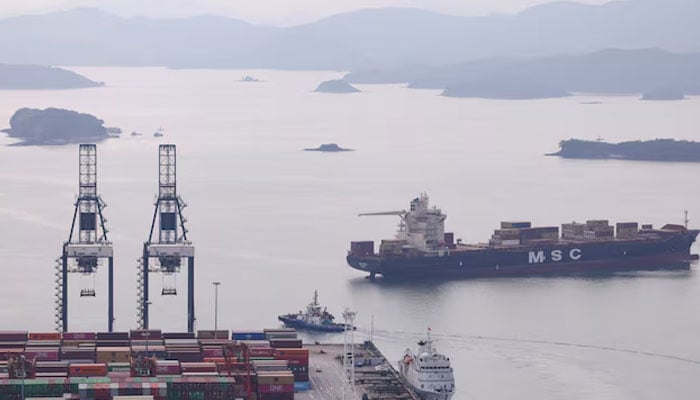 A cargo ship carrying containers approaches a terminal of the Yantian port in Shenzhen, Guangdong province, China October 30, 2025.—Reuters
