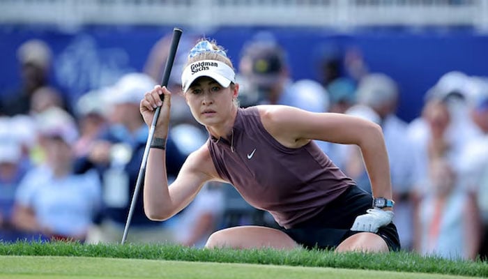Nelly Korda prepares to putt on the 18th hole during the final round of The Chevron Championship golf tournament. —Reuters