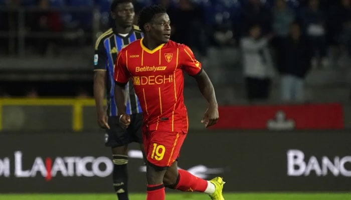 Lecces Lameck Banda celebrates after scoring the opening goal during the Serie A soccer match between Pisa and Lecce in Pisa, Italy. —AFP
