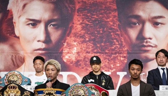 Naoya Inoue (front L) and Junto Nakatani (front R) attend a press conference ahead of their May 2 fight. —AFP