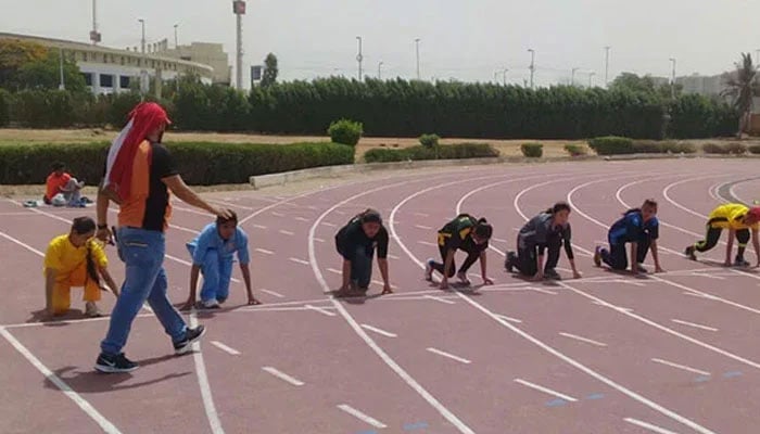 The representational image shows athletes ready to start the race. — Radio Pakistan/File